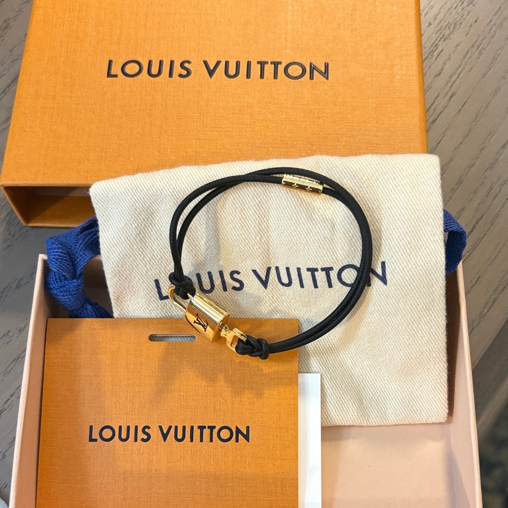 Authentic Louis Vuitton Black Padlock Cord Bracelet with Gold Accents